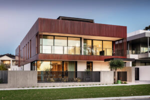 Copper Clad Home 1|Copper Clad Home facade|Copper Clad Home corner view|Copper Clad Home 4|Copper Clad Home plant|Copper Clad Home entrance|Copper Clad Home door|Copper Clad Home office windows|Copper Clad Home office|Copper Clad Home fireplace|Copper Clad Home cava|Perth Custom Home kitchen|Perth Custom Home kitchen sink|Perth Custom Home kitchen sink|Copper Clad Home stairs|Copper Clad Home stairs|Copper Clad Home stairs|Copper Clad Home .18|Copper Clad Home sink