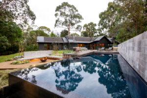 giving it a natural swimming hole aesthetic. 12|Contemporary Home Melbourne 15|cos design logo