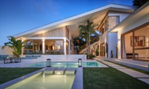Bali Meets Palm Springs|Open-plan bathroom|Bedroom suite Canggu villa|Luxury stays in Canggu|Luxury bathroom Bali villa|Modern villa ensuite|Biombo Design|Bali tropical retreat|Bali Meets Palm Springs|Neutral color palette|Sunset cocktails Bali|Luxury Villa Canggu