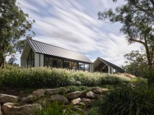 Custom Homes Dural|Custom Homes Dural|Open plan living|Contemporary barn form|Cross laminated timber|Barn inspired architecture|Black joinery detail|Architectural rural design|Glass walkways bushland|European inspired design|Modern barn bedroom|Mallinger Constructions home|Venetian plaster walls|Reclaimed timber details|Rural pool retreat|Sustainable outdoor living|Rural architectural landscape|Pangari Creek views|Mallinger Constructions|Outdoor firepit area|||||Dural Custom Homes