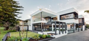 Custom Homes Marybrook|Marybrook Beach House|Luxury beach house|Coastal living room design|Full-height glass living walls|Alfresco dining with ocean views|Oceanfront patio and deck design|Marybrook Beach House|Award Winning Marybrook Home||||||||||||||