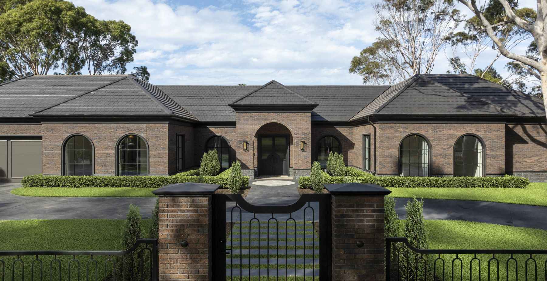 Custom Homes Werribee|Custom Homes Werribee|Evans Building Group|Premium interior finishes|Book-matched marble benchtop|Luxury family residence|Ensuite bathroom|Custom cabinetry design|Victorian architecture Werribee|Werribee luxury home|Modern European Home|Dome ceiling design|Circa Curated materials|Suspended brick fireplace|Modern classic interiors|Luxury interior detailing|Victorian luxury builders|Evans Building Group|Custom architectural joinery|Custom steel-framed windows|Architectural arches