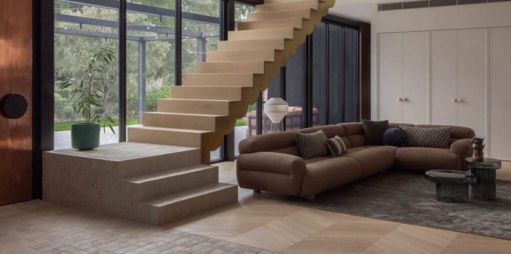 Custom Homes Yarra Valley|Hedger Constructions|Luxury kitchen design|Yarra Valley home|Architectural storytelling|Floating timber staircase|Modern barn architecture|Tiberio stone kitchen|Terrazzo bathroom|Custom bathroom interiors|Bathroom geometric patterns|Award-winning builders Victoria|Custom Homes Yarra Valley|Mount Dandenong views