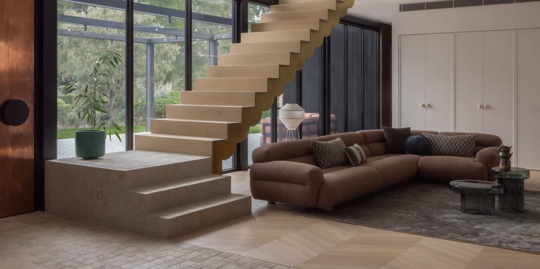 Custom Homes Yarra Valley|Hedger Constructions|Luxury kitchen design|Yarra Valley home|Architectural storytelling|Floating timber staircase|Modern barn architecture|Tiberio stone kitchen|Terrazzo bathroom|Custom bathroom interiors|Bathroom geometric patterns|Award-winning builders Victoria|Custom Homes Yarra Valley|Mount Dandenong views