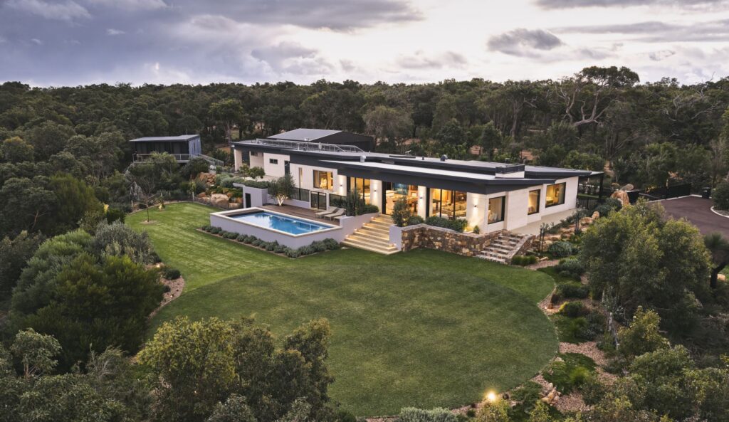 Eagle Bay Renovation|Eagle Bay renovation|Eagle Bay Renovation|Western Australia luxury homes|Elegant bedroom styling|Luxury bathroom design|Timber cabinetry|Modern family homes Perth|Coastal landscaping design|Award-winning renovation project|Open-plan living spaces|WA custom builder|Seamless indoor-outdoor connection|Ocean-view residence|Granite fireplace|Heated pool|Perth builder Adrian Zorzi|Southwest WA builder|||Entry|Open garden area