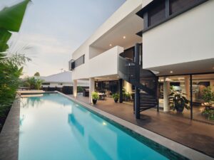 |Coolbinia Custom Home|Weststyle|Sculptural residential architecture|Sculptural staircase design|Marble kitchen design|Weststyle custom homes|Family-focused luxury home|Coolbinia custom home|Luxury home builder Perth|Ensuite bedrooms family home|Skylit bedroom design|Luxury master suite design|Warm contemporary interiors|Curved architecture design|Resort-style pool design|