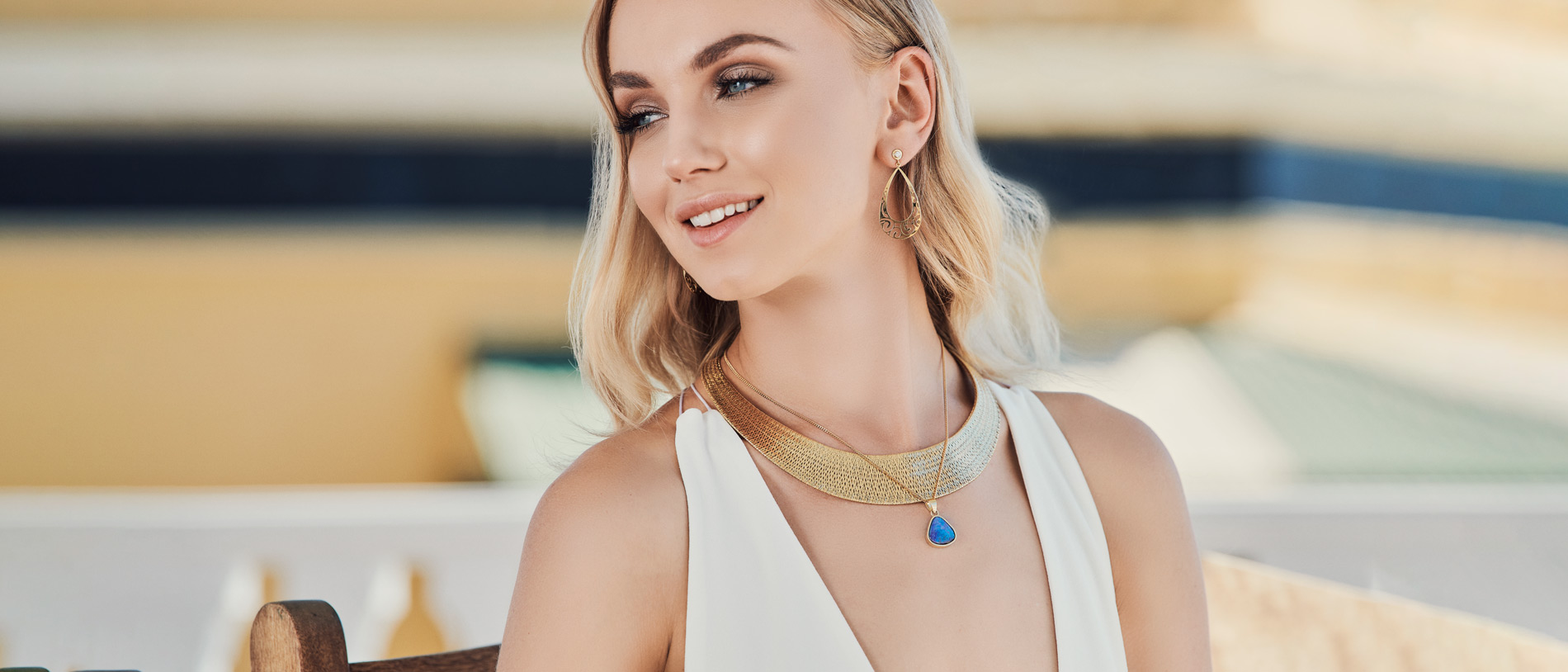 Smales woman with necklace and earrings|Smalles Jewellers historic picture|||Smale Jewellers golden ring|Smales collection long earrings||Smales Jewellers model new collection|Smales Jewellery logo|Smales collection rings|Smales Jewellery bracelets|Smales collection pendants and earrings